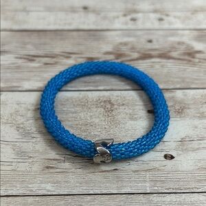 Sashka Roll On Blue Nepal Glass Braided Bracelet with Silver Wave Clasp